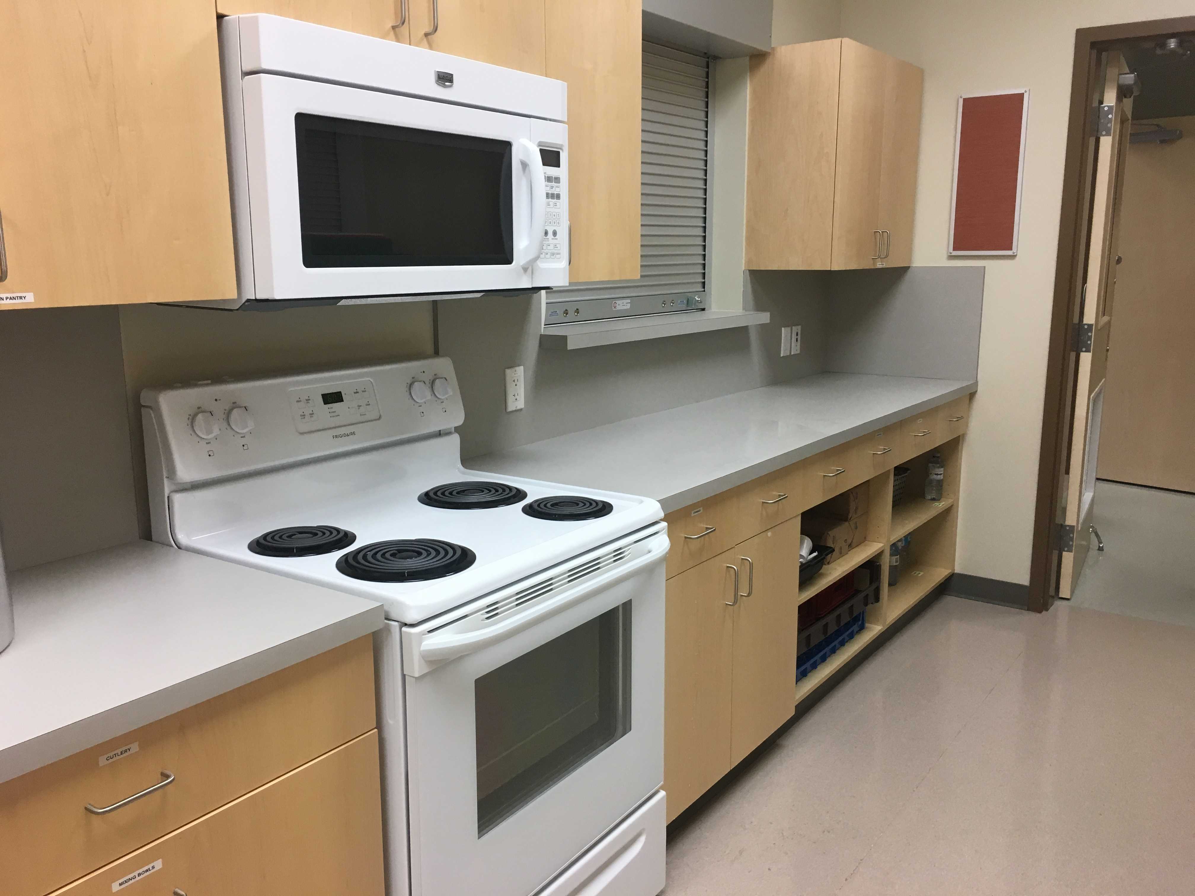 Kitchenette: stove and concession window